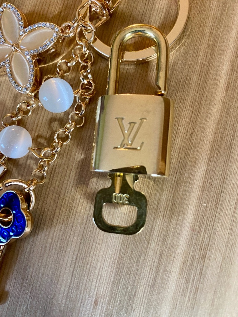 Authentic Louis Vuitton Padlock & Key Set #300 – Bonus Bag Charm Included